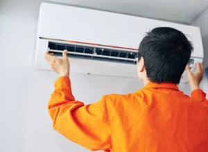 worker doing an hvac installation